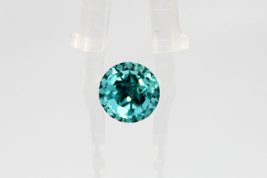 “Covenant Eye” Round Cut Paraiba-color Lab-grown Garnet