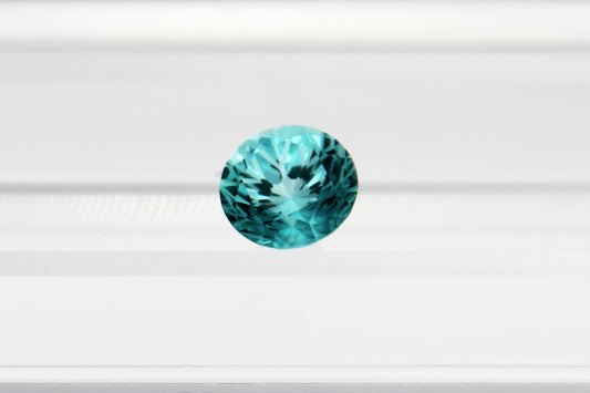 Swallowtail-style Round Cut Paraiba-color Lab-grown Garnet
